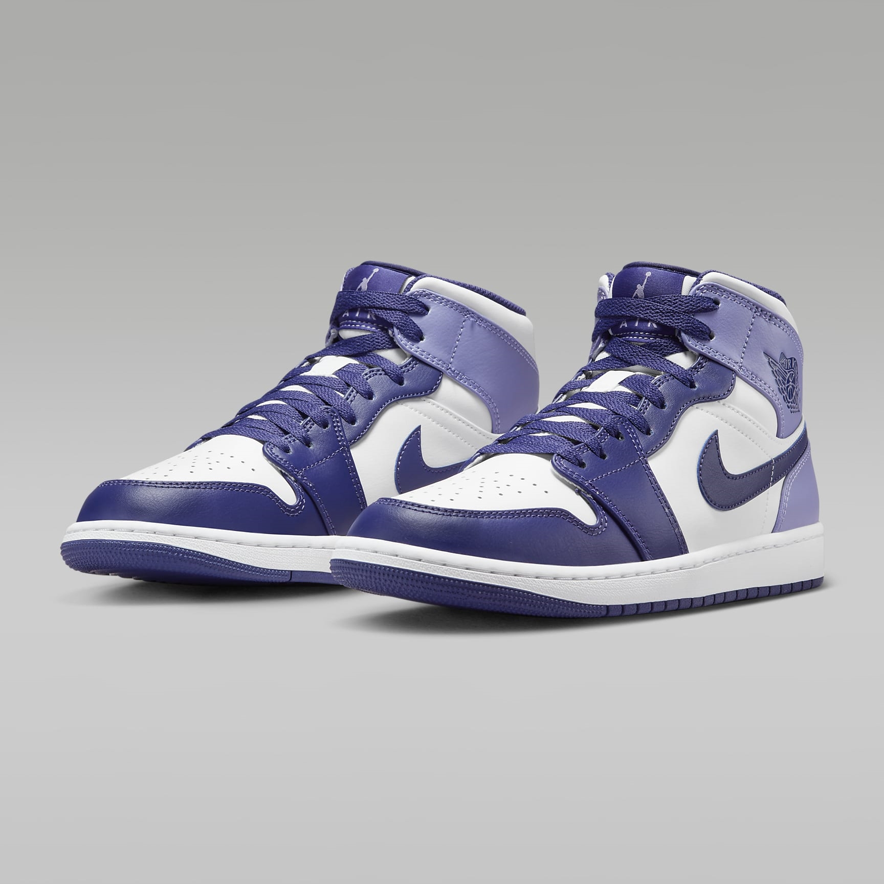 The purple and white 2025 jordans