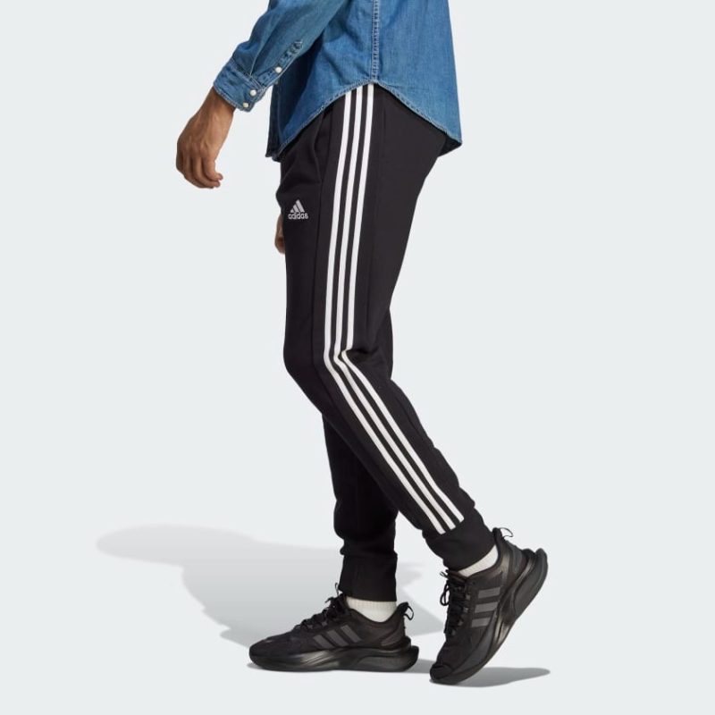 Adidas กางเกงขายาว ESSENTIALS FRENCH TERRY TAPERED CUFF 3-STRIPES | Black / White | (HA4337) - Image 2