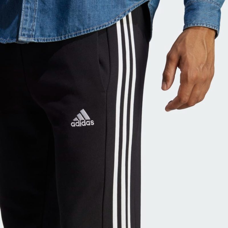 Adidas กางเกงขายาว ESSENTIALS FRENCH TERRY TAPERED CUFF 3-STRIPES | Black / White | (HA4337) - Image 6